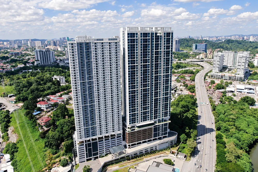 Aerial view of The Hermington tower beside the highway
