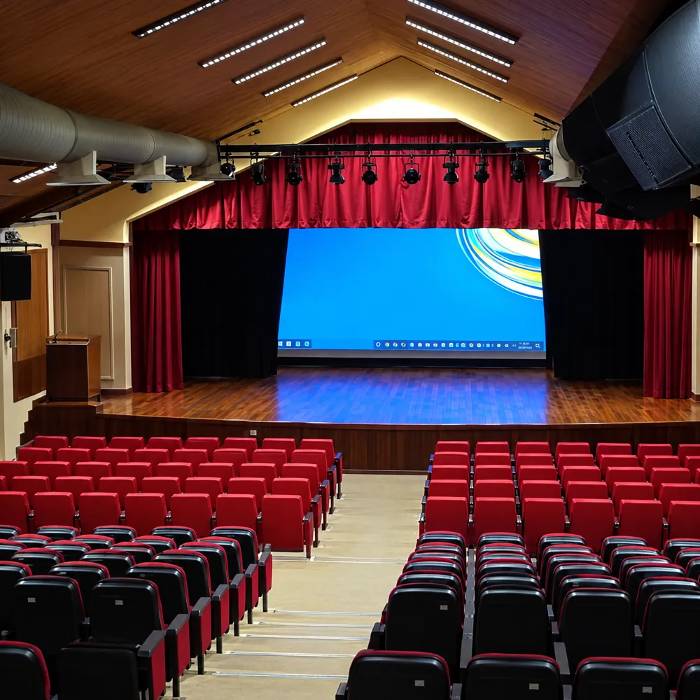 Great Hall auditorium with a wide projected image on stage